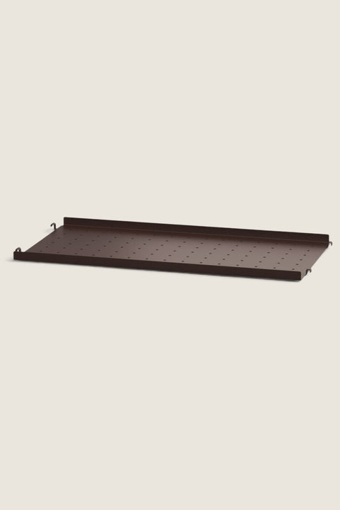 Bolina String System dark brown perforated metal shelf with a low edge, 58x30 cm, for modular wall storage.