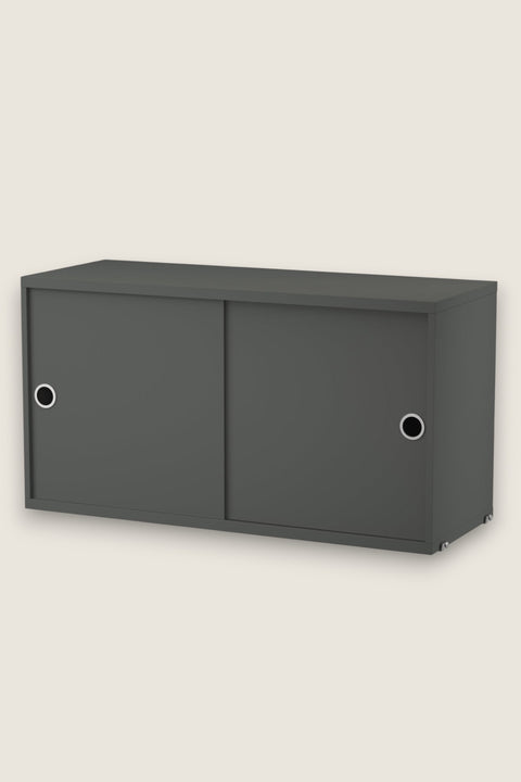 Bolina dark grey String System cabinet with sliding doors and circular metal handles for modular wall storage
