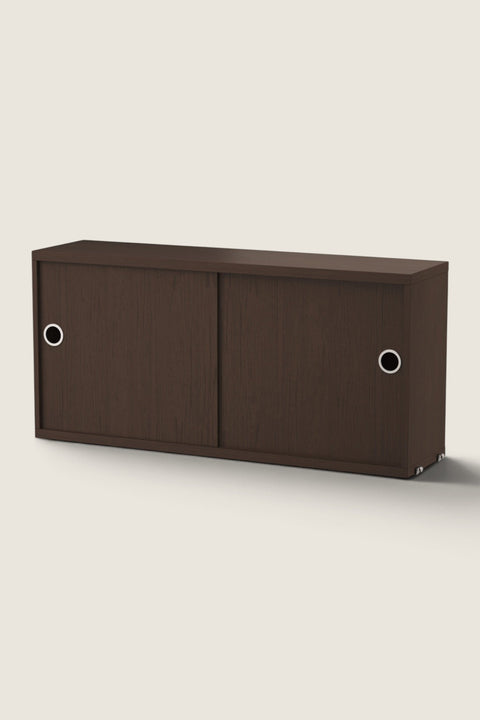 Bolina String System cabinet in dark oak with sliding doors and circular silver handles for modular shelving