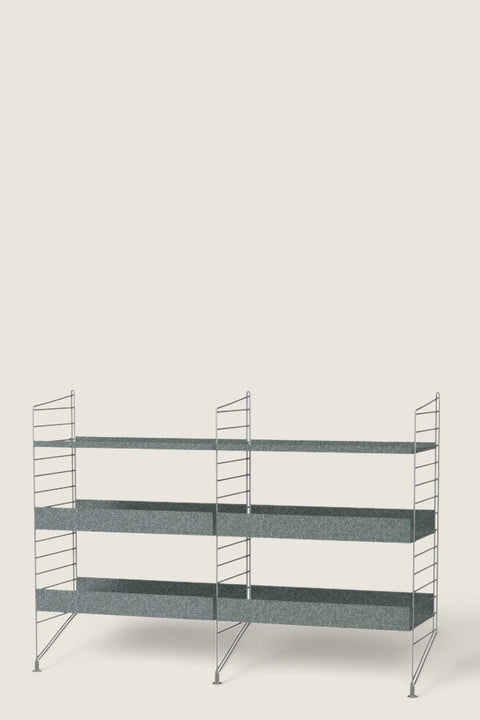 Bolina String System Outdoor A floor-mounted galvanized metal shelving unit with high and low edge shelves.