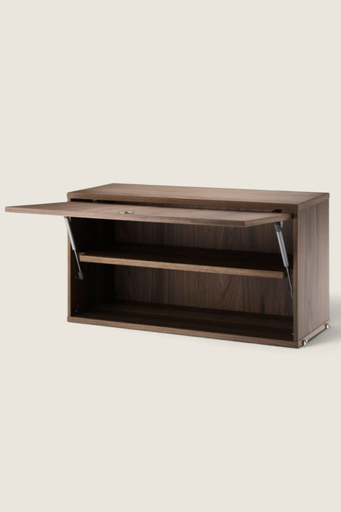 Bolina String System flip door cabinet in walnut veneer with an adjustable shelf and modern minimalist design.