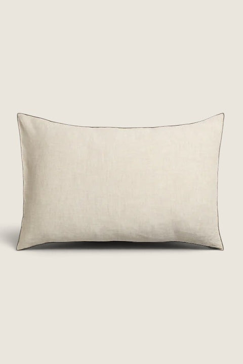 Bolina Sunshine Stitch linen cushion cover in oatmeal with a subtle dark contrast stitch edge, 40x60cm rectangular.