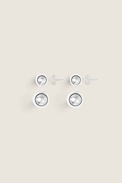 Bolina The Caroline silver drop earrings featuring a polished round stud and a dangling spherical pendant.