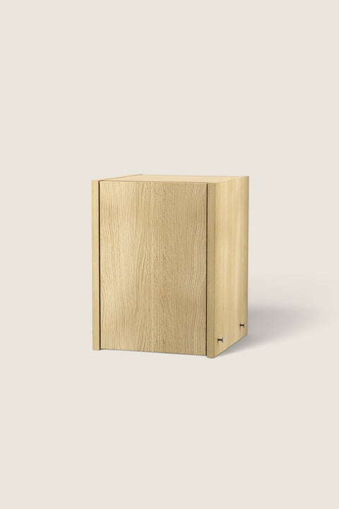 Bolina Tiny oak wood storage cabinet for String System with a minimalist design and light wood veneer finish.