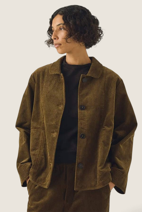 Bolina TOAST bronze green organic cotton corduroy jacket with rounded collar and horn buttons worn by a model