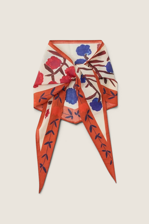Bolina TOAST cotton bandana in cream with a cobalt blue and red folk-art flower crown print and orange borders.