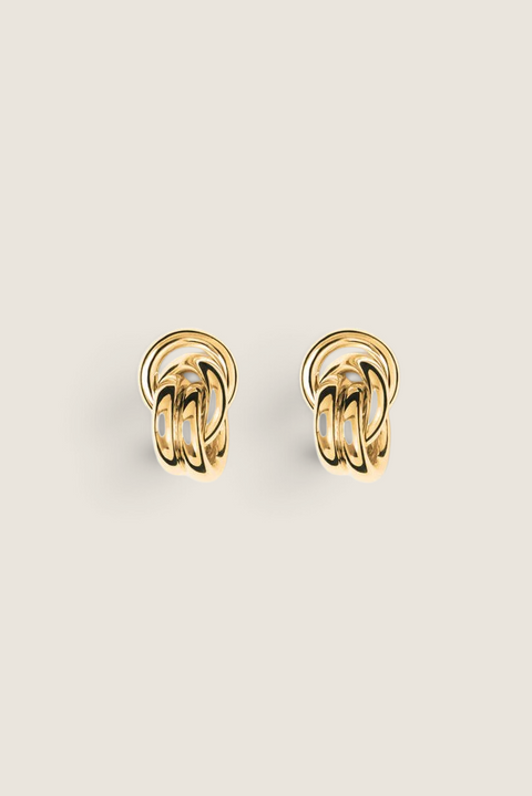 Bolina Vera gold knot-style sculptural earrings with a polished finish and a close-fitting design.