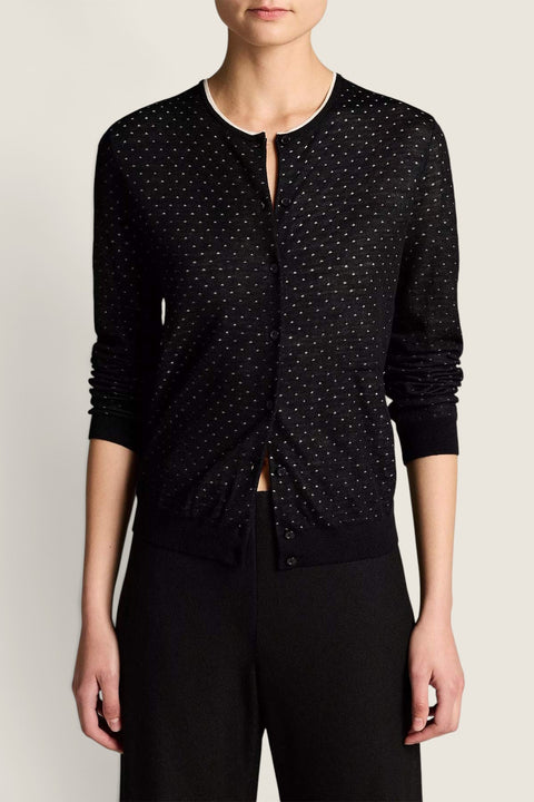 Bolina Vince black cardigan with off-white dot motif, crew neck, and button-down front worn by a model