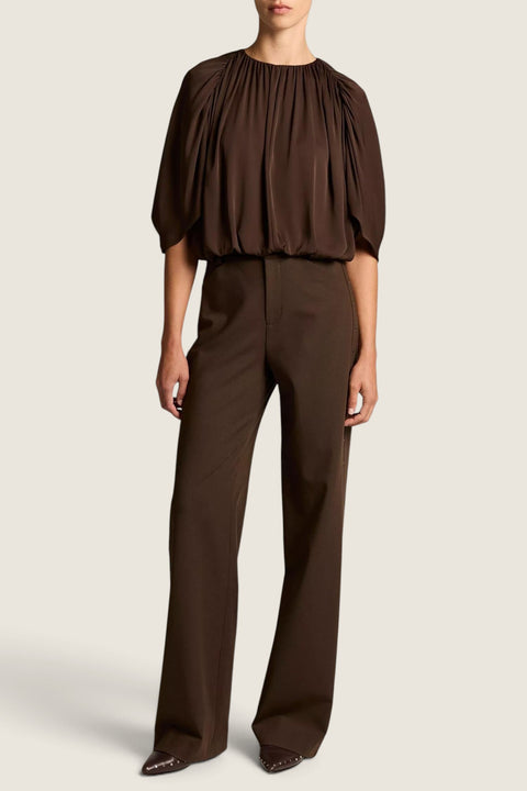 Bolina Vince gathered cape bubble blouse in pinewood green with a subtle sheen, worn with matching tailored trousers.
