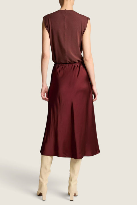 Bolina Vince matte satin slip skirt in black rose, featuring an elastic waistband and elegant midi length.