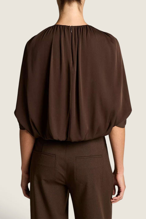 Bolina Vince gathered cape bubble blouse in dark pinewood green with a smooth finish, back view.