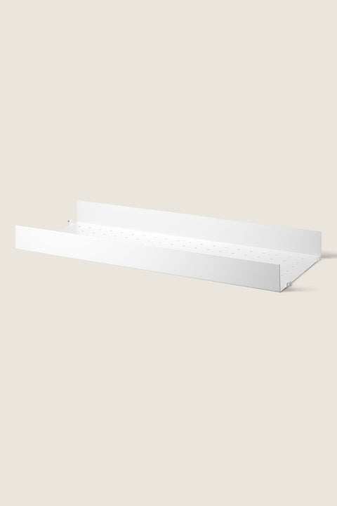 Bolina white powder-coated steel shelf with high edges and perforated surface for String System storage
