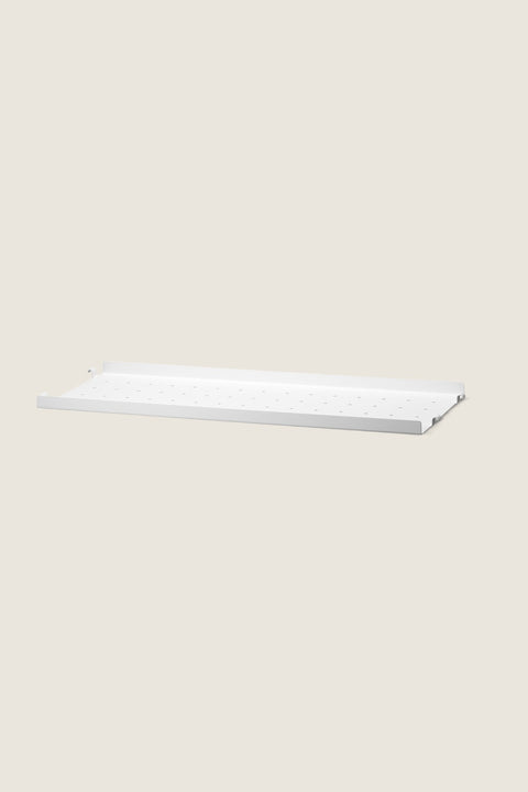 Bolina white powder-coated steel shelf with low edges and perforated surface for String System shelving