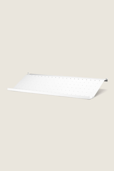 Bolina white metal shoe shelf for String System with a perforated surface for organized entryway storage