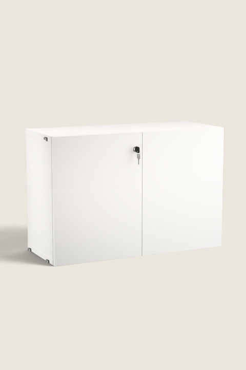 Bolina white String System cabinet with a lockable door and push-open mechanism, made of lacquered MDF.
