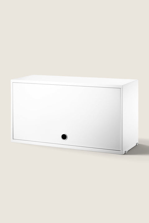 Bolina white String System flip door cabinet with a minimalist design for wall-mounted storage.