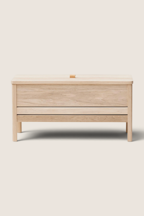 Bolina A Line storage bench in white oiled oak with a lift-up seat and minimalist Scandinavian design.