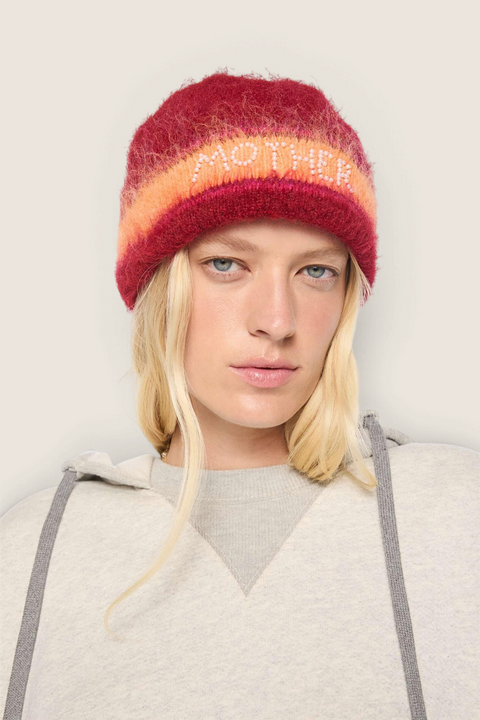 Bolina MOTHER beanie in brushed wool blend with red, pink, and orange stripes and pearl logo detail on a model