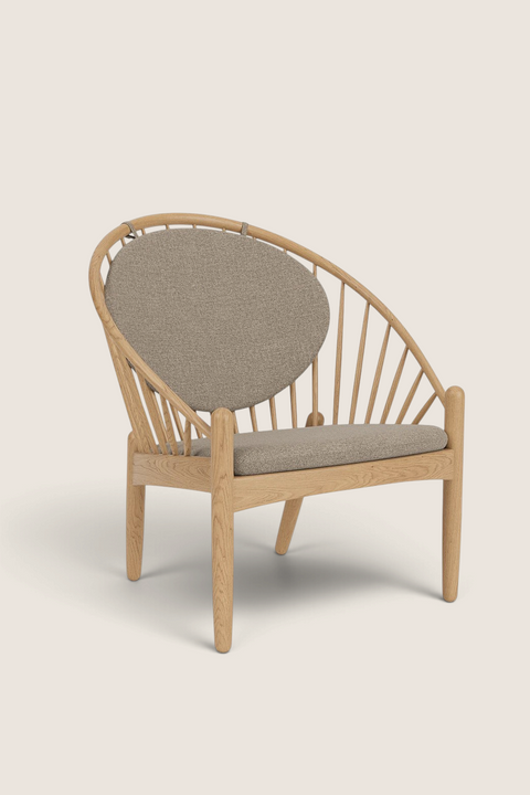 Bolina J166 Jørna lounge chair in lacquered oak with light grey wool and linen blend cushions and spindle back design.