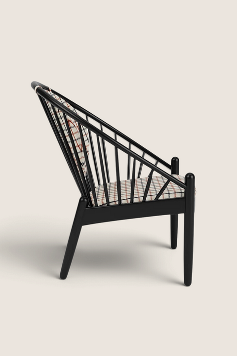 Bolina J166 Jørna lounge chair in black oak with red plaid fabric cushions, side view of iconic Danish design