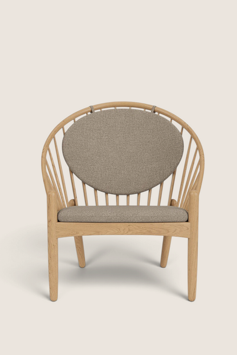 Bolina J166 Jørna armchair in lacquered oak with light grey wool and linen blend cushions, front view.